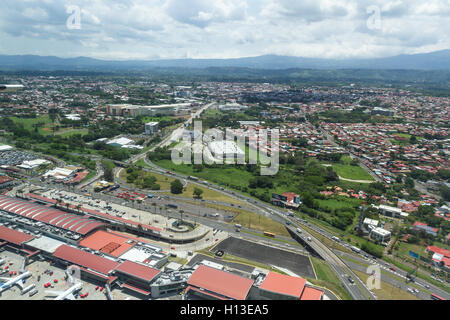 San Jose, Costa Rica - May 24 : aerial view of the city of Alajuela with a partial view of the airport from the interior of a sm Stock Photo