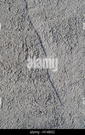 gray rough uneven concrete surface as texture Stock Photo