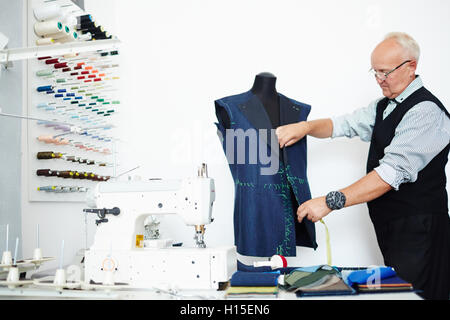 Dressmaker at work Stock Photo