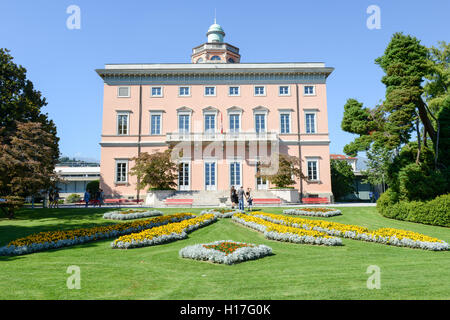 Lugano, Switzerland - 25 august 2016: people walking in front of the villa on Ciani botanical park in the center of Lugano, Swit Stock Photo