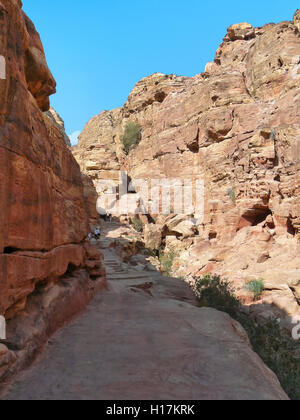 Cliff face of the ancient Nabatean rock cut monument named Urn Tomb ...