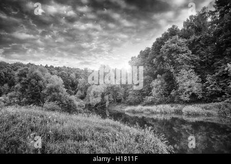 summer evening on the mountain river black and white landscape Stock Photo
