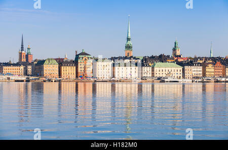 Cityscape of Stockholm. Gamla Stan city district in summer morning with German Church spire as a skyline dominant Stock Photo