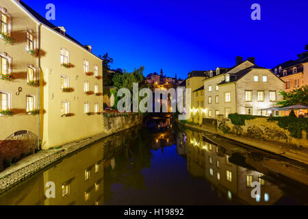 Beautiful Alzette river side scene on road Rue Munster of Luxembourg at night Stock Photo