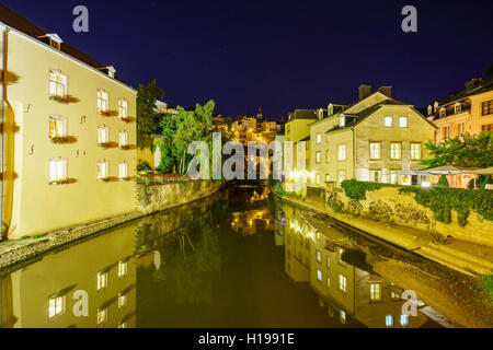 Beautiful Alzette river side scene on road Rue Munster of Luxembourg at night Stock Photo