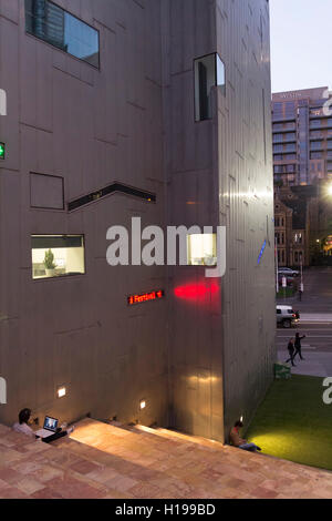 People using the free public Wi-Fi network at Federation Square Melbourne Victoria Australia Stock Photo