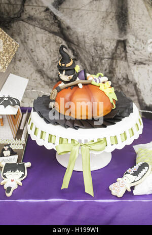 Tart with witch and pumpkin cakes, halloween Stock Photo