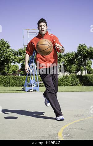 Young playing basketball sports center Stock Photo