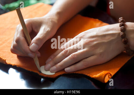 hands of a fashion designer at work with cloth Stock Photo