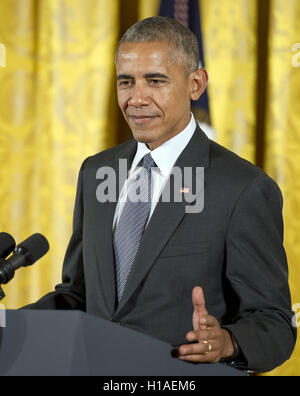 Washington, District of Columbia, USA. 22nd Sep, 2016. United States President Barack Obama makes remarks prior to presenting the 2015 National Medals of Arts and 2015 National Humanities Medals during a ceremony in the East Room of the White House in Washington, DC on Thursday, September 22, 2016.Credit: Ron Sachs/CNP Credit:  Ron Sachs/CNP/ZUMA Wire/Alamy Live News Stock Photo