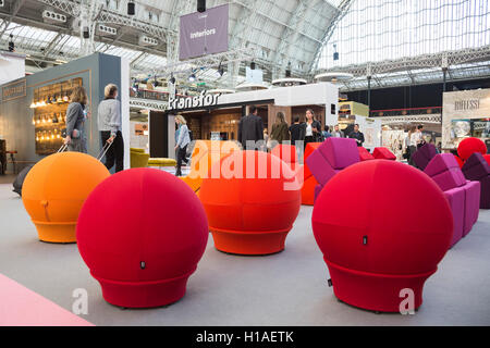 London, UK. 22 September 2016. Colourful seating furniture by Lina Furniture. The UK's largest design show 100% Design takes place at London Olympia from 21 to 24 September 2016. Credit:  Bettina Strenske/Alamy Live News Stock Photo