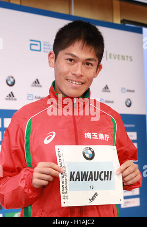 Berlin, Germany. 23rd Sep, 2016. Japanese marathon runner Yuki Kawauchi shows his running number during a press conference in Berlin, Germany, 23 September 2016. Photo: Jörg Carstensen/dpa/Alamy Live News Stock Photo