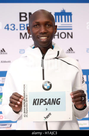 Berlin, Germany. 23rd Sep, 2016. Marathon runner Wilson Kipsang (Kenia) shows his running number during a press conference in Berlin, Germany, 23 September 2016. Photo: Jörg Carstensen/dpa/Alamy Live News Stock Photo