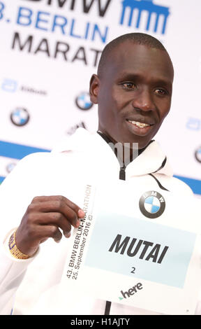 Berlin, Germany. 23rd Sep, 2016. Marathon runner Emmanuel Mutai (Kenia) shows his running number during a press conference in Berlin, Germany, 23 September 2016. Photo: Jörg Carstensen/dpa/Alamy Live News Stock Photo