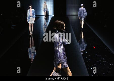 Milan, Italy. 23rd Sep, 2016. Models present creations at Giorgio Armani fashion show during Milan Fashion Week Spring/Summer 2017 in Milan, Italy, Sept. 23, 2016. Credit:  Jin Yu/Xinhua/Alamy Live News Stock Photo