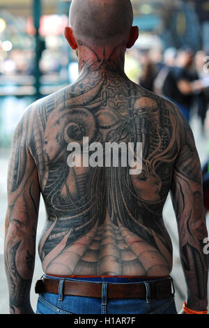 London, UK. 24th September, 2017. A man with a Japanese style body suit  tattoo at the 13th London International Tattoo Convention, which took place  over the weekend in Tobacco Dock, east London.