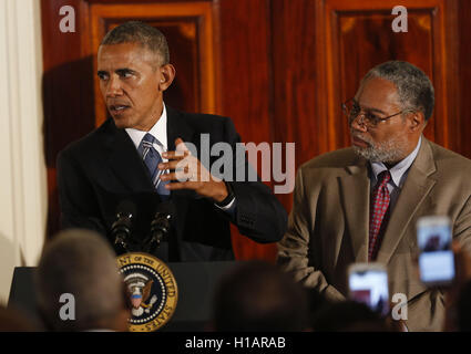 Washington, District of Columbia, USA. 23rd Sep, 2016. US President Barack Obama delivers remarks, while Lonnie Bunch, the director of the Smithsonian National Museum of African American History and Culture listens, at the reception in honor of the opening of the museum in the Grand Foyer of the White House September 22, 2016, Washington, DC. Credit: Aude Guerrucci/Pool via CNP Credit:  Aude Guerrucci/CNP/ZUMA Wire/Alamy Live News Stock Photo