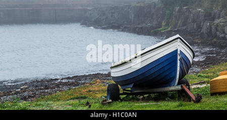 Small Fishing Boat Out Of Water on Trailer Stock Photo