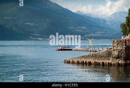 Varenna, Italy - September 4th, 2015: people enjoying themselves in the resort town of Varenna near Lake Como in North Italy. Stock Photo