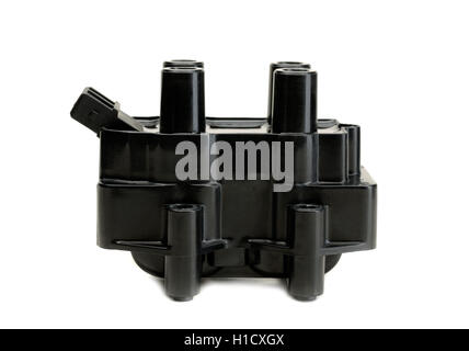 Ignition coil for gasoline four-cylinder internal combustion engine. Side view. Isolate on white. Stock Photo