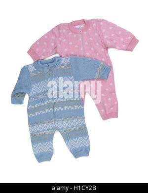 Two knitted pink and blue rompers. Isolate on white. Stock Photo