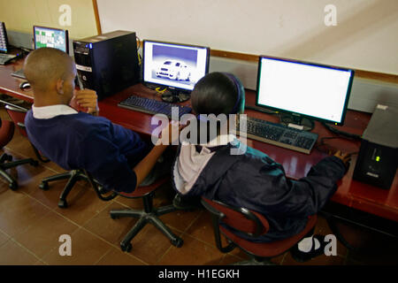 Children working on computers in computer classroom, St Mark's School, Mbabane, Hhohho, Kingdom of Swaziland Stock Photo