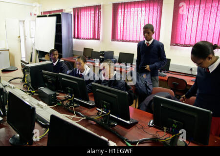 Children working on computers in computer classroom, St Mark's School, Mbabane, Hhohho, Kingdom of Swaziland Stock Photo