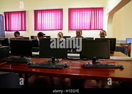 Children working on computers in computer classroom, St Mark's School, Mbabane, Hhohho, Kingdom of Swaziland Stock Photo