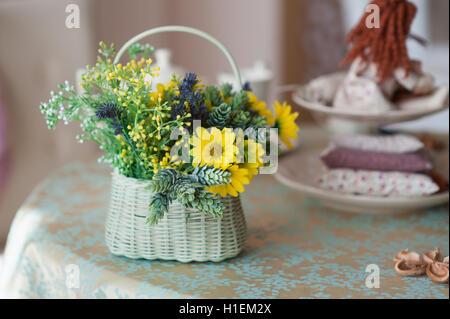 beautiful bouquet of flowers in a vase on the table Stock Photo