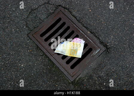 Euro notes on gully Stock Photo