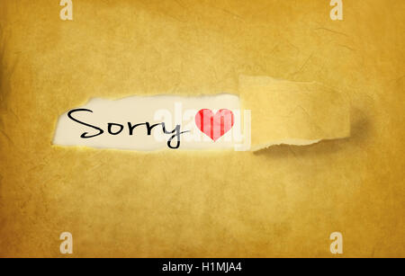 sorry handwritten on vintage paper Stock Photo