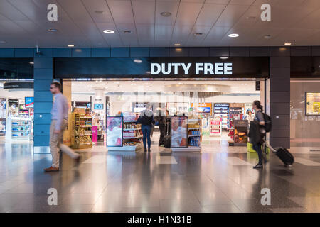 Many passager shopping in Duty Free shop in International Airport before departure Stock Photo