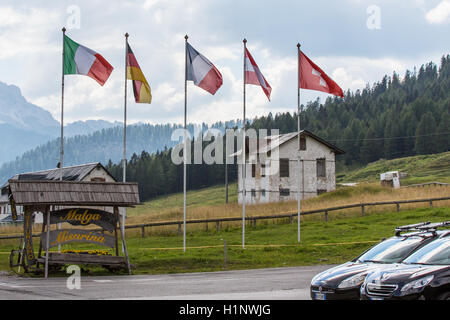 Flags flying greeting you to Misurina Stock Photo