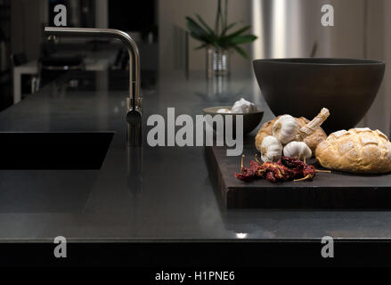 Cool and Classy, Modern and Stylish Kitchen with Black Granite Stone Worktop Stock Photo