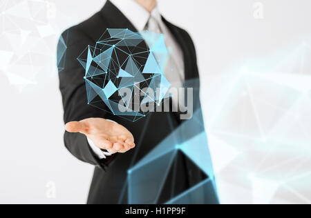 close up of businessman showing virtual projection Stock Photo