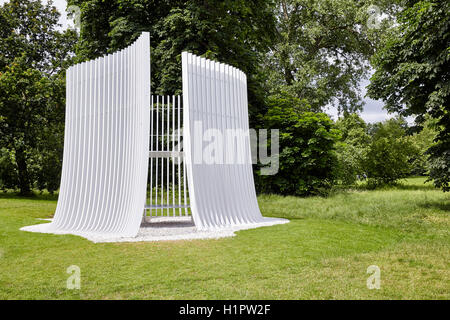 The Summer House standing in the green landscape of Kensington Garden. The Summer House, London, United Kingdom. Architect: Asif Khan, 2016. Stock Photo