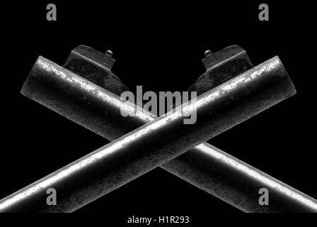ancient crossed pistols isolated on black background Stock Photo