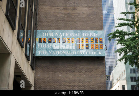 The National Debt Clock in New York  showing the US debt approaching $20 trillion is seen on Friday, September 16, 2016.  Real-estate mogul, the late Seymour Durst, created the clock on Feb. 20, 1989 to call attention to  Reaganomics. (© Richard B. Levine) Stock Photo