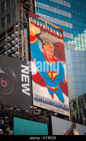 An electronic billboard promoting the Donald Trump presidential campaign in Times Square in New York on Thursday, September 15, 2016. The animated display, showing Trump as 'Super Trump' ,was paid for by the Committee to Restore America's Greatness which has no affiliation with the candidate. The four-day advertising campaign is also being shown along I-4 in Central Florida. (© Richard B. Levine) Stock Photo