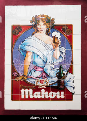 Ceramic tiled advertisement for the still popular Spanish brand Mahou beer which was first brewed in 1890. Stock Photo