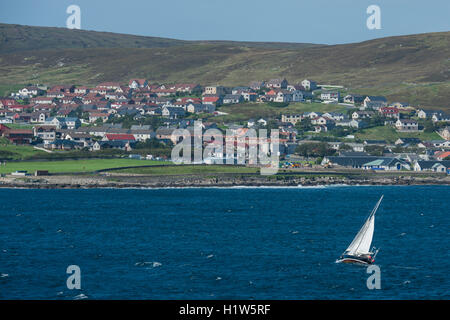 United Kingdom, Shetland Archipelago, Mainland. Lerwick, Britain's most northerly town. Coastal view with sailboat. Stock Photo