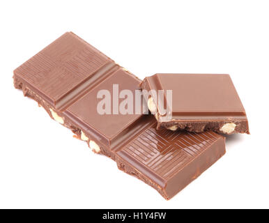 Tasty morsel of milk chocolate with nuts. Stock Photo