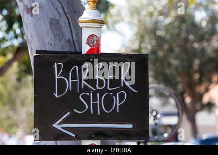 Barber shop sign in Sydney written on a blackboard,Sydney,Australia Stock Photo