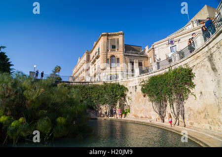 SYRACUSE, ITALY - SEPTEMBER 14, 2015: The Arethusa's fountain on the island of Ortygia in Syracuse, Sicily, Italy. Stock Photo