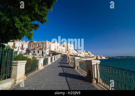 SYRACUSE, ITALY - SEPTEMBER 14, 2015: Embankment on the island of Ortygia in Syracuse, Sicily, Italy Stock Photo