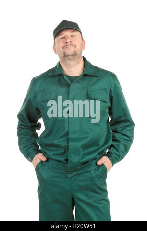 Worker in green workwear. Stock Photo