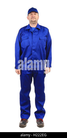 Worker in blue workwear. Stock Photo