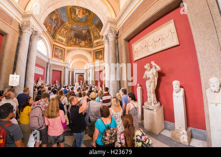 Crowds of tourists visiting the Vatican museum Stock Photo
