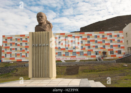 EUROPE, NORWAY, Svalbard (Spitsbergen),  Gronfjorden, Barentsburg (old Russian mining town), Lenin statue & modern apartments Stock Photo