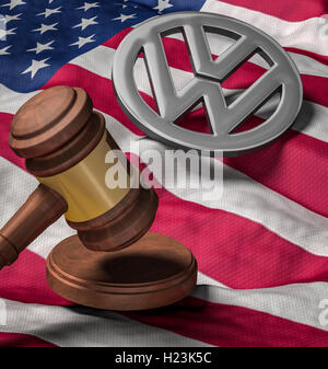 Gavel on US flag, VW logo, emissions scandal Stock Photo